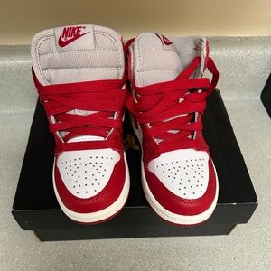 White and red Jordan 1s